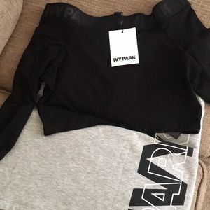 IVY PARK LOGO JOGGER SKIRT SIZE MEDIUM (8-10)